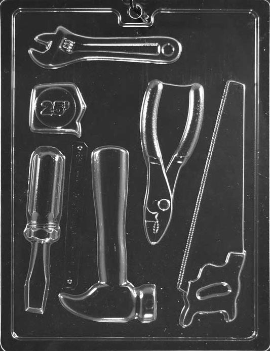 Various chocolate tools including wrench and hammer