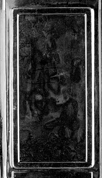 Chocolate mold shaped like a full-size license plate with bold detailing and flat text space.