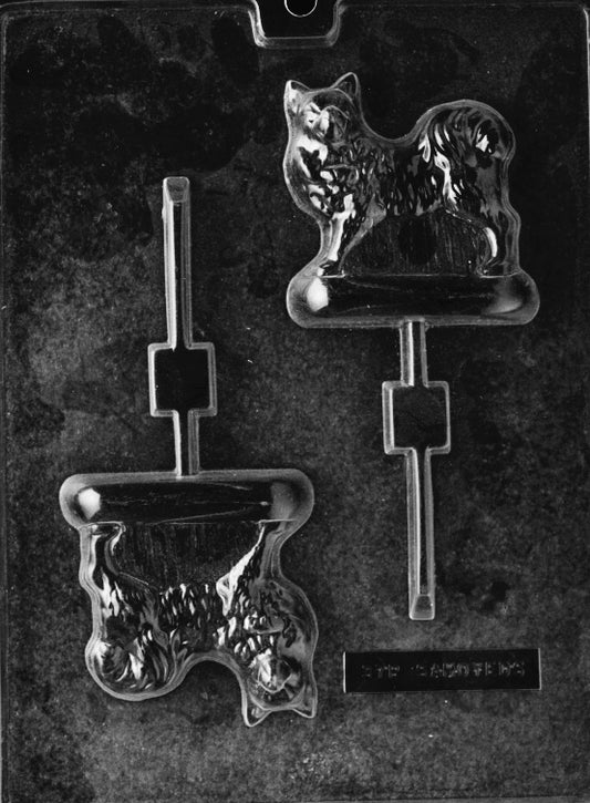 Circular chocolate mold of Samoyed face with Lollipop stick slot, fluffy cheeks, and smiling eyes.