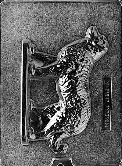 Chocolate mold of Great Pyrenees dog with thick coat and upright stance. Designed for medium chocolate figures.