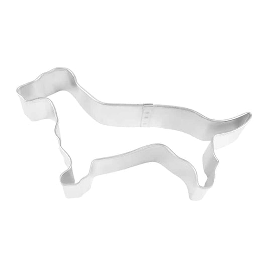 Overhead view of a metal Dachshund-shaped cookie cutter, showcasing the breed’s long body and short legs.