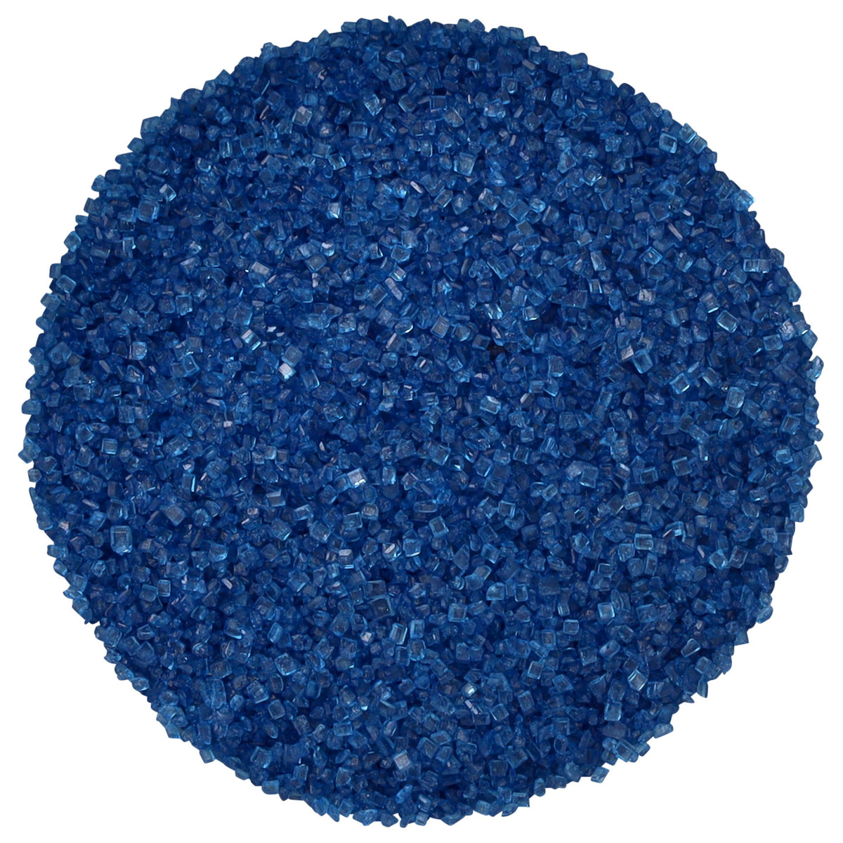 Close-up of dark blue sanding sugar showing a circular mound of coarse, translucent deep blue sugar crystals with sparkling, faceted surfaces against a white background.