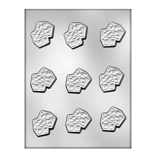 A clear plastic chocolate mold designed for creating dice-shaped chocolates. There are ten cavities, each shaped like a three-dimensional dice with dots indicating numbers from one to six. The mold’s glossy surface suggests it's made for easy release of the chocolates once set.