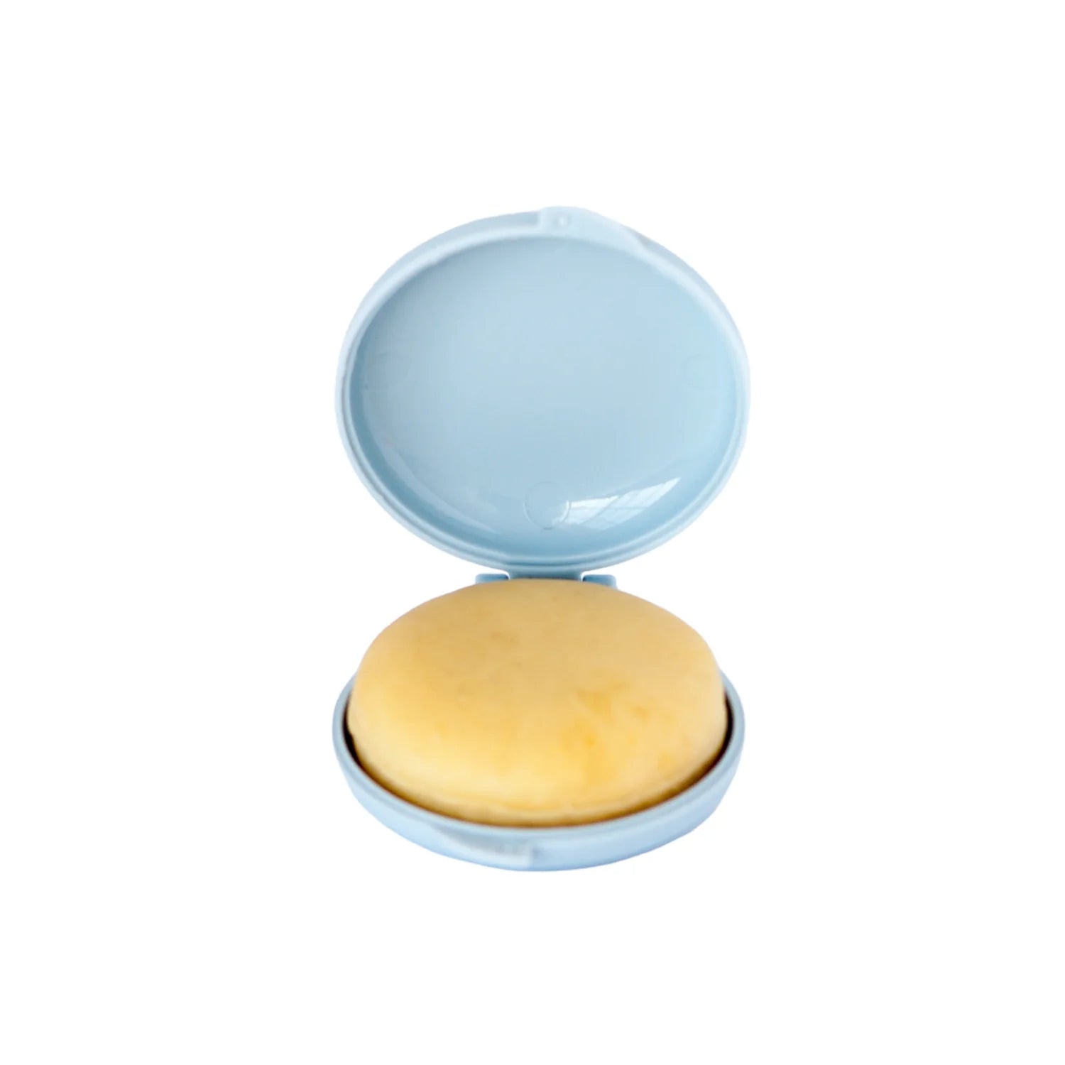 Open disc cake pop mold with a perfectly shaped dough disc inside, showing smooth surface ideal for decorating.