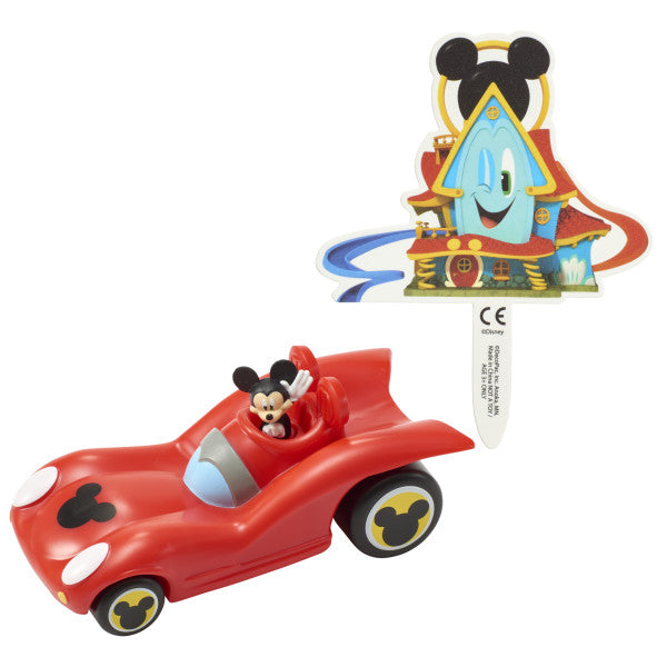 A red roadster toy with Mickey Mouse driving and a colorful Funhouse-themed paper standee.