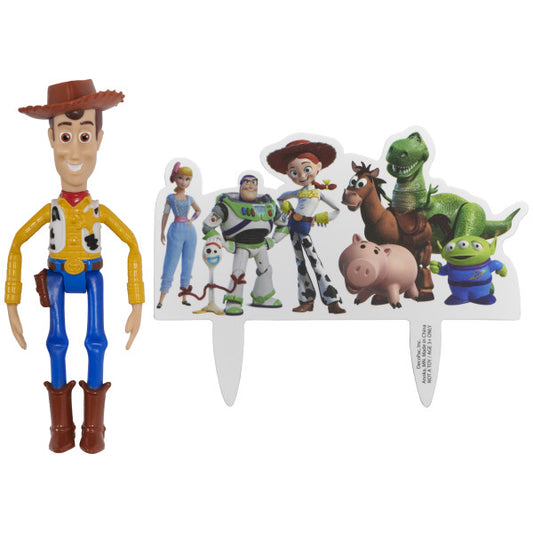 A Toy Story-themed DecoSet featuring a poseable Woody figurine and a character backdrop with Buzz, Jessie, Bo Peep, Rex, and more.