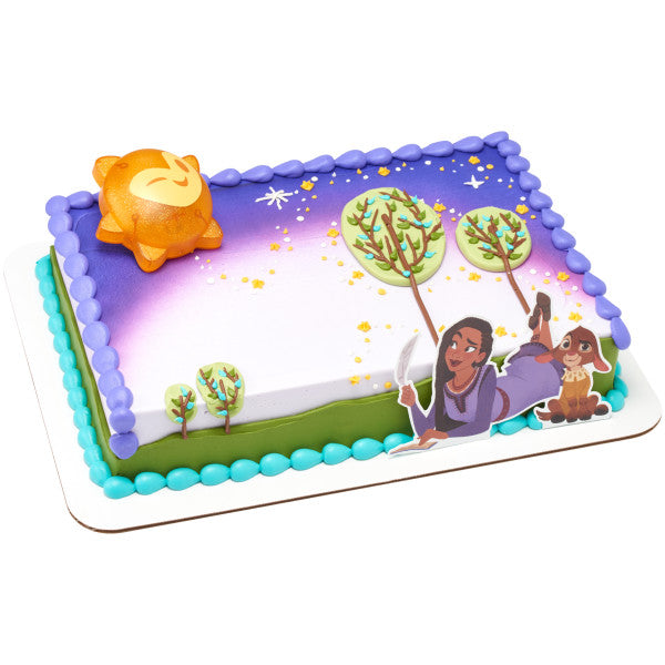 A rectangular cake decorated with a starry night sky theme, topped with the Disney's Wish Shining Star DecoSet.