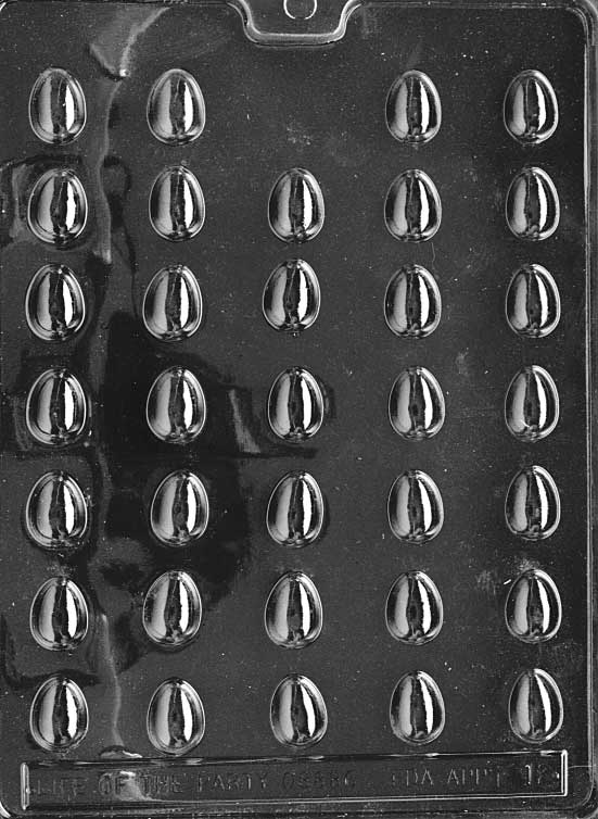 Chocolate mold of small oval egg shapes. Designed for detail work or small chocolates.