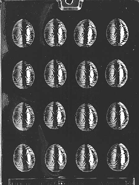 Chocolate mold with patterned egg shapes, including stripes and swirls. Designed for spring candies.