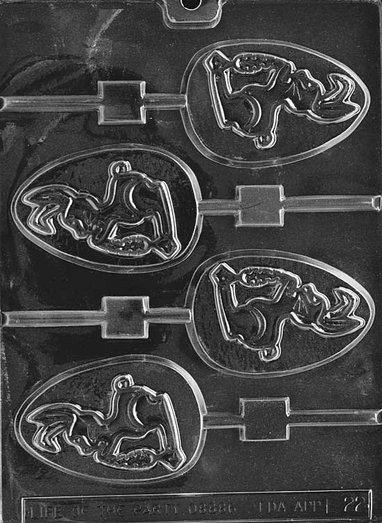 Chocolate mold featuring a rabbit sitting on an egg with a lollipop stick channel.