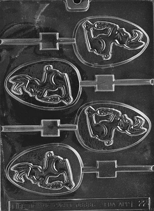 Chocolate mold featuring a rabbit sitting on an egg with a lollipop stick channel.