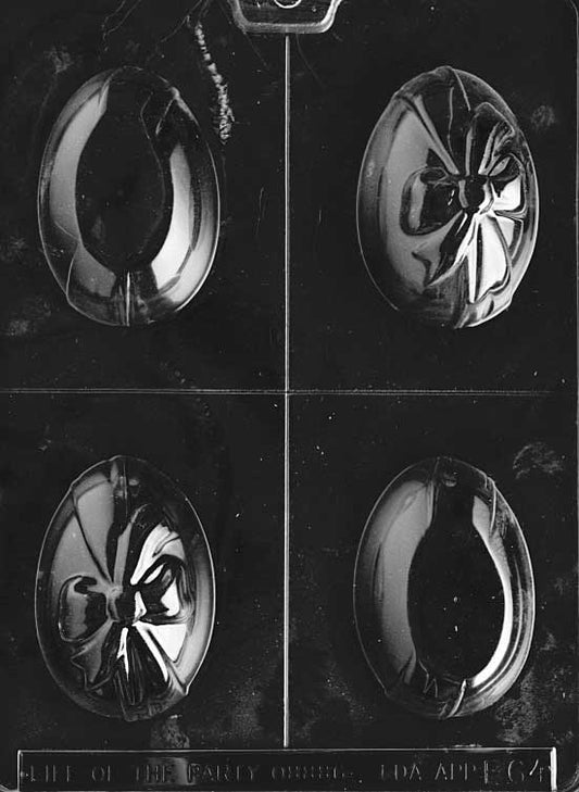 Chocolate mold of egg with bow design, standing shape with decorative detail.