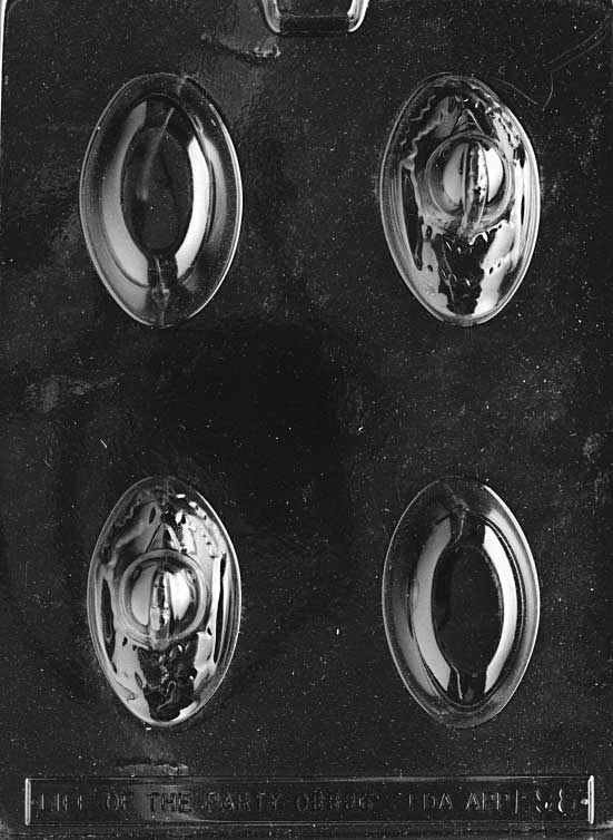 Hen perched on chocolate egg with sculpted texture and vertical height.