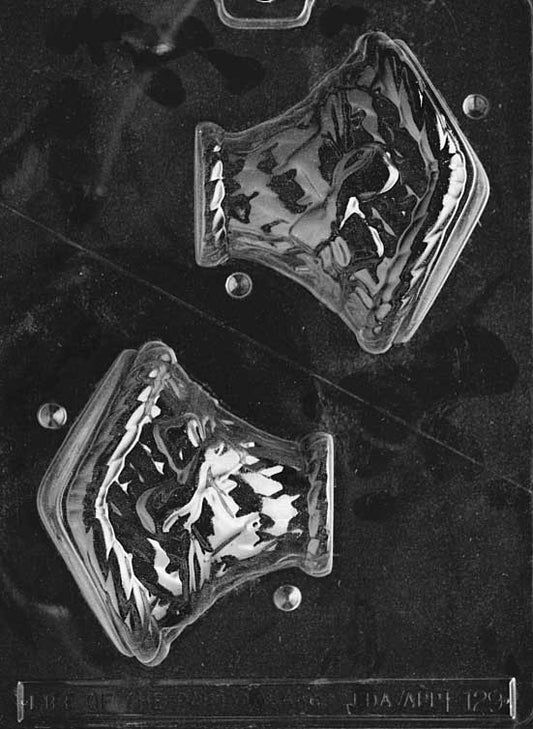 Chocolate mold shaped like small woven basket with open top.