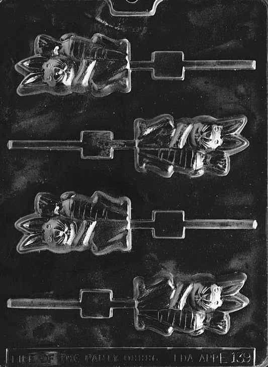 Chocolate mold of bunny with carrot designed as a lollipop.
