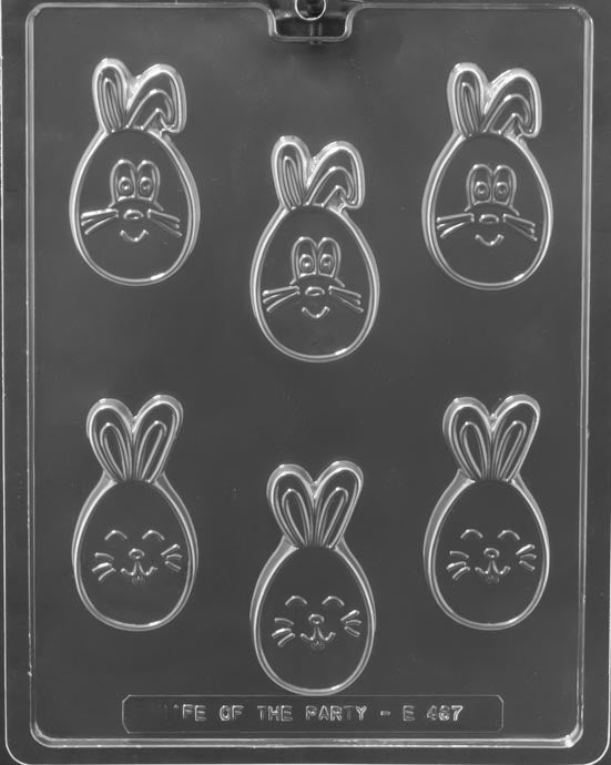 SMILING BUNNY EGG PIECES mold showing oval chocolates with smiling bunny face.