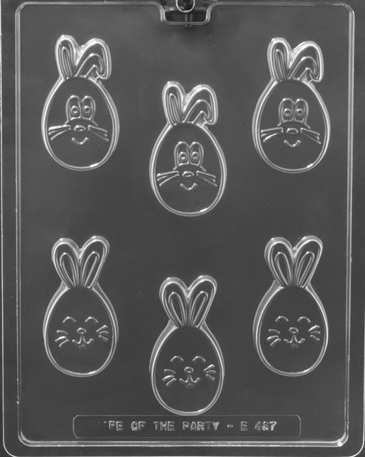 SMILING BUNNY EGG PIECES mold showing oval chocolates with smiling bunny face.