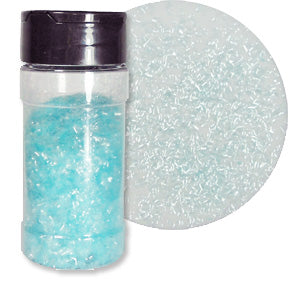 A bottle of pastel blue edible glitter flakes with a close-up showing their shimmering texture.