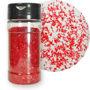 A bottle of red edible glitter flakes with a close-up showing their shimmering texture.