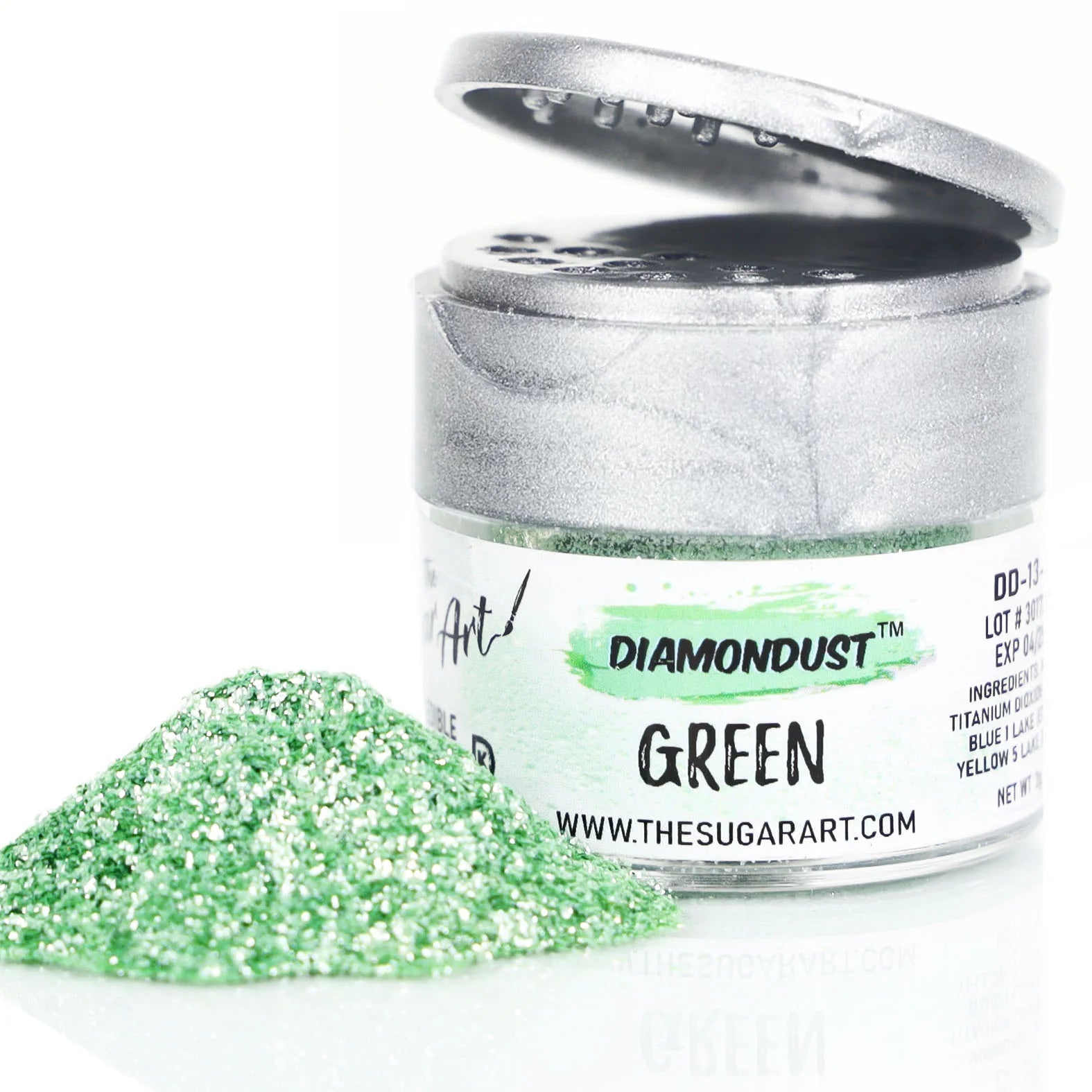Open jar of Green DiamondDust edible glitter with a metallic silver lid and a bright pile of fine, sparkling green particles beside it, labeled “DIAMONDUST GREEN.”