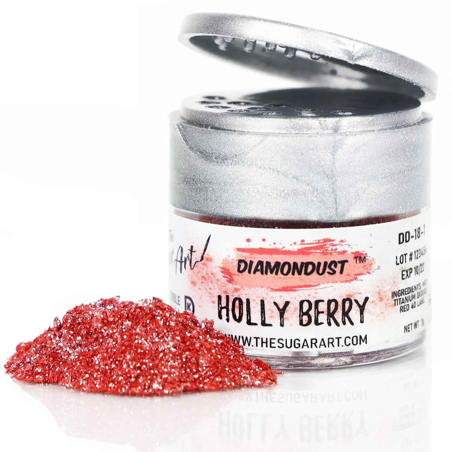 Open jar of DiamondDust Holly Berry edible glitter with a mound of vivid red sparkle beside it; silver flip-top lid and “HOLLY BERRY” label visible. 
