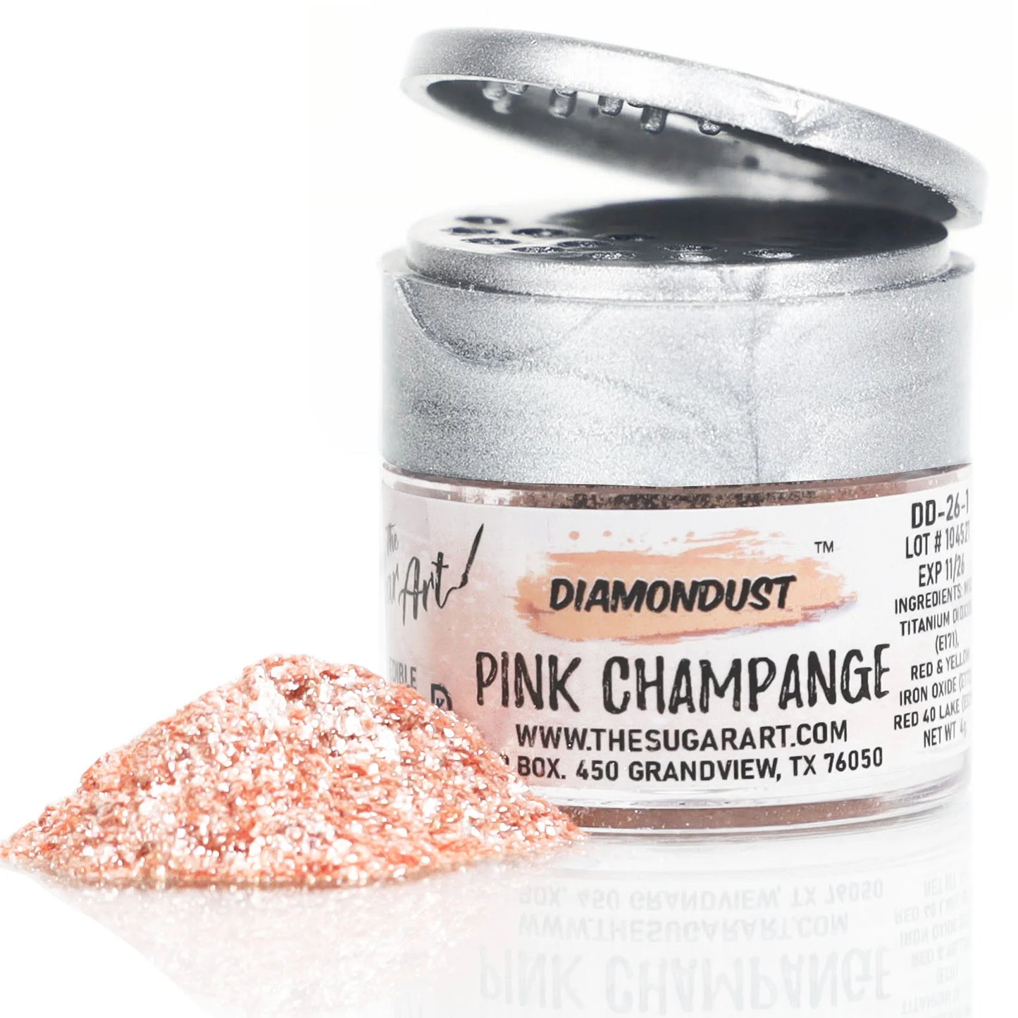 Open jar of DiamondDust Pink Champagne edible glitter with a small mound of rosy gold sparkle in front; silver flip-top lid and product label visible. Keywords: pink champagne edible glitter, rose gold shimmer, cake decorating.