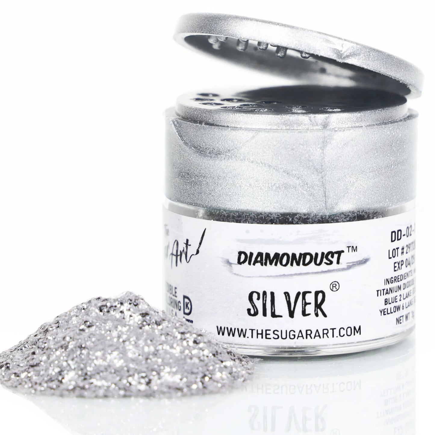 Open jar of DiamondDust Silver edible glitter with a mound of fine silver sparkle in front; silver flip-top lid and product label reading “SILVER” visible. Keywords: silver edible glitter, DiamondDust, cake decorating, 4 grams.