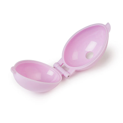 Open view of the egg-shaped mold showing the interior cavity and air hole for even dough distribution.