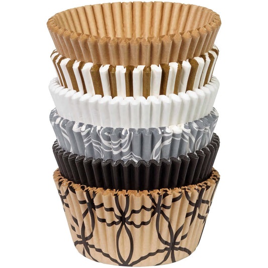 A stack of elegant cupcake liners in various designs and colors, including gold, white, white and gold stripes, white and silver scripted, black, and black and gold floral, 150 count package. Perfect for weddings, anniversaries, holidays, and special occasions.