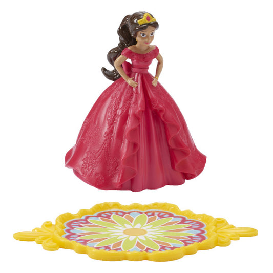 A detailed Elena of Avalor figurine in a red gown with a decorative twirling base.