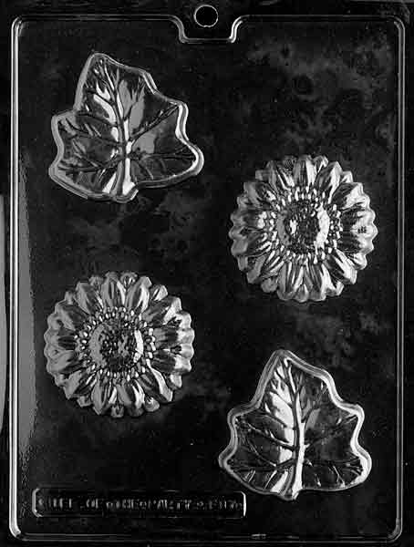 FLOWER/LEAF mold with chocolate cavities shaped like flowers and leaves.