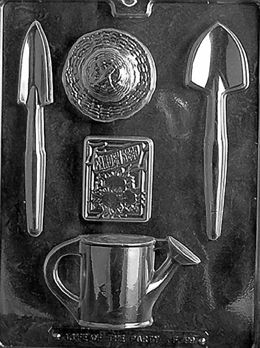 GARDENING KIT mold featuring assorted chocolate gardening-themed designs.
