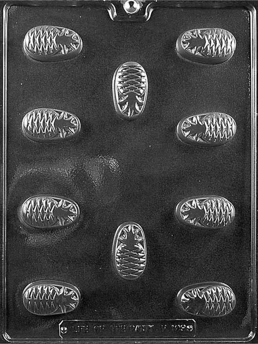 PINEAPPLE FOR FILLING mold featuring pineapple-shaped chocolate cavities.