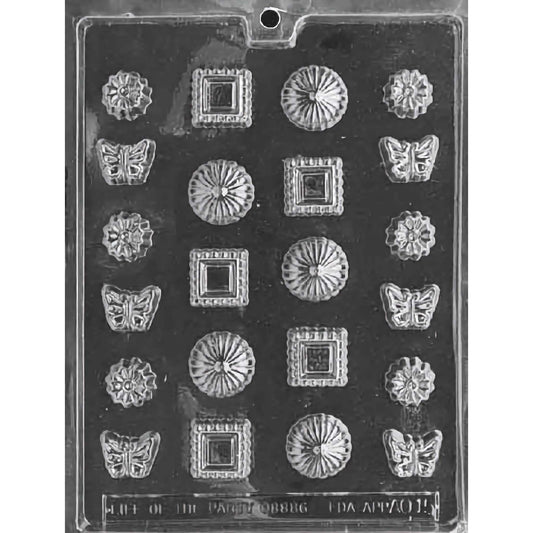 Fancy Assortment chocolate mold with 18 cavities featuring designs such as butterflies, flowers, and intricate squares, made from food-grade plastic.