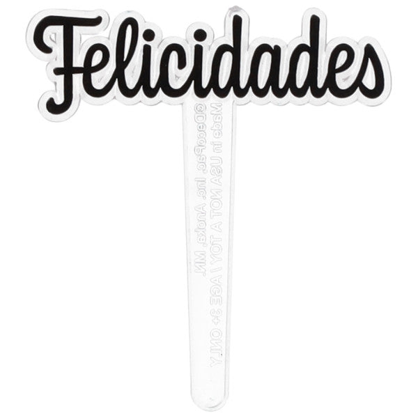 Pick para cupcake con la palabra “Felicidades” en letras negras estilo script sobre una estaca transparente, fondo blanco.