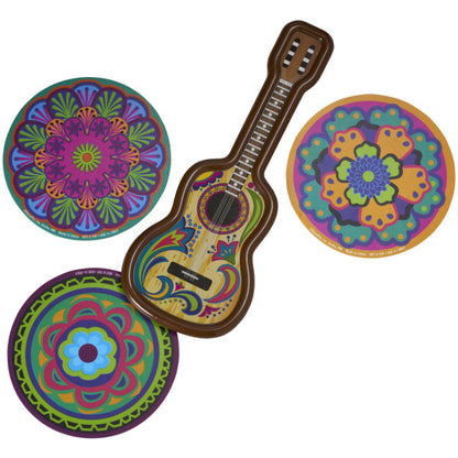 A decorative mini-guitar with intricate patterns and three colorful round coasters with floral and geometric designs.