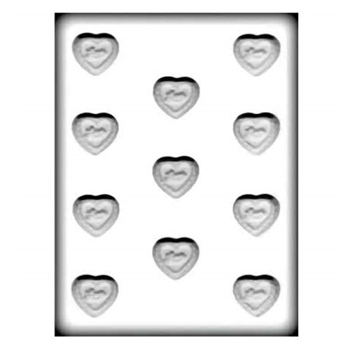 A white hard candy mold for making heart shaped candies. There are 11 cavities in each mold