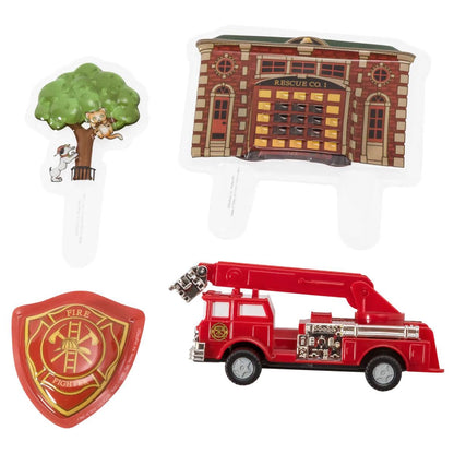 Fire and Rescue cake topper kit, including a firetruck, fire station, shield, and a tree with a cat and dog, for thematic birthday cakes or community service celebration desserts.