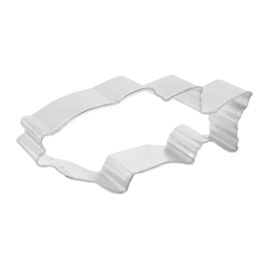 Side view of fish-shaped cookie cutter with ridged edges.