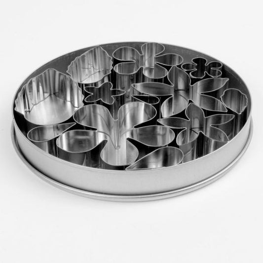 Ateco 4849 12-piece stainless steel flower and leaf cutter set, neatly nested in a round storage tin with various floral and leaf shapes.