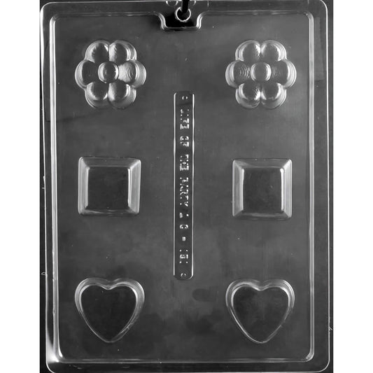 Clear plastic chocolate mold featuring a diverse array of shapes, including two flower-shaped compartments with five petals each, two heart-shaped compartments, and two square (cube) compartments.