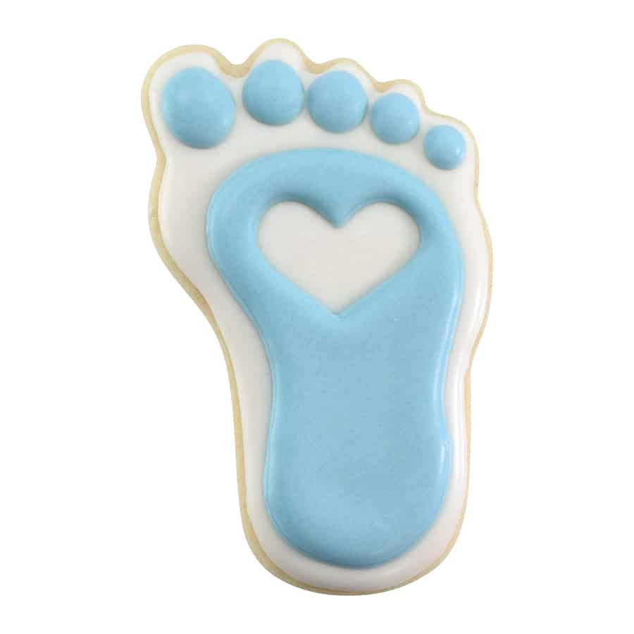 Blue and white footprint cookie with a heart-shaped cutout in the center, crafted for a baby-themed celebration.