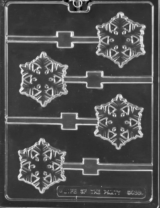 Clear 4-cavity snowflake lollipop mold with detailed six-point flakes and built-in stick channels, shown flat with embossed text at the bottom reading Life of the Party.