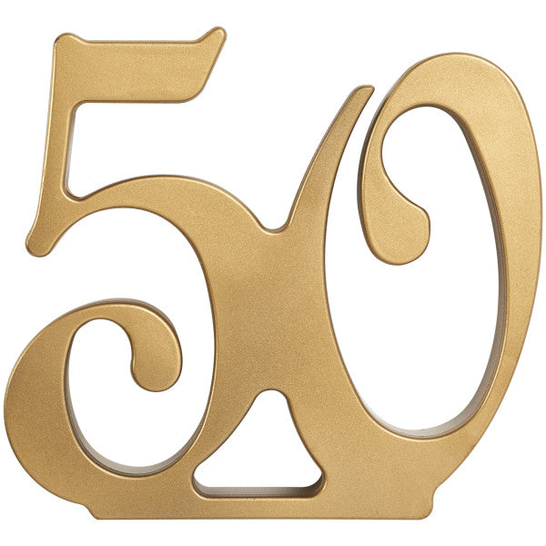 Gold "50" cake topper with elegant swirled numerals and a smooth metallic finish.