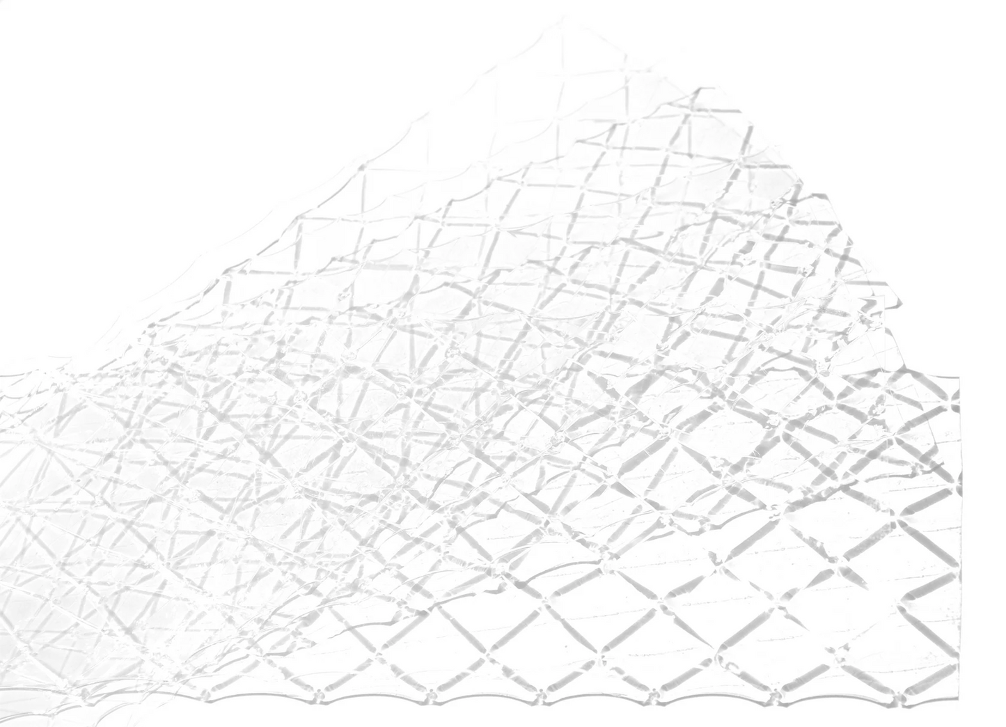 Clear gold leaf gelatine sheets with a faint grid pattern, shown wrinkled and overlapping on a white background.
