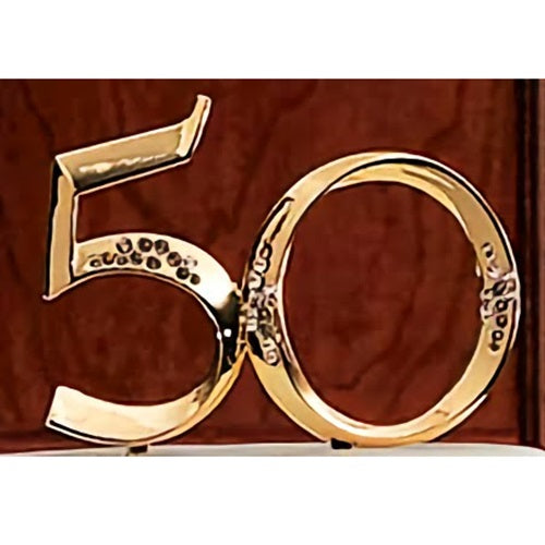 Gold 50th anniversary topper by Wilton, featuring a stylish '50' in a golden finish, perfect for celebrating a golden jubilee milestone, adding a touch of sophistication to any anniversary cake.