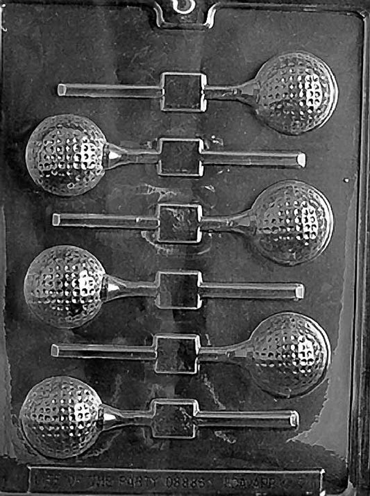 Clear lollipop mold with six golf ball cavities featuring detailed dimples, each aligned to a stick channel on a glossy plastic sheet.