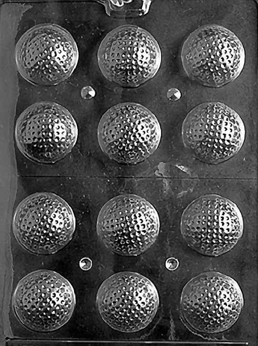 Clear multi-cavity chocolate mold showing small half-sphere golf balls with detailed dimples, arranged in rows to create 3D balls when paired.