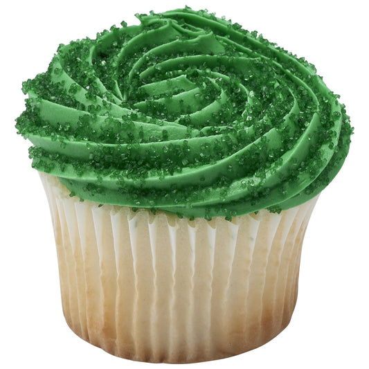 Vanilla cupcake in a white paper liner topped with a large swirl of green buttercream frosting covered in sparkling dark green sanding sugar crystals.
