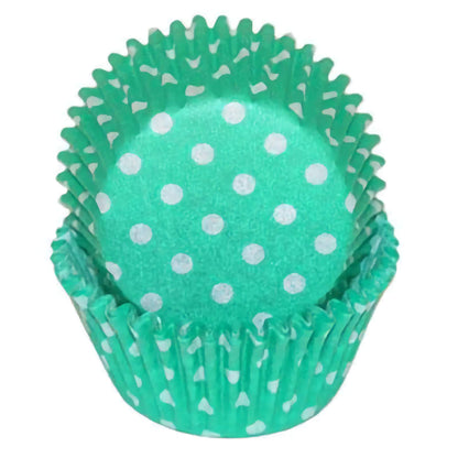 green cupcake baking cup with white polka dots, displayed in a nested stack.